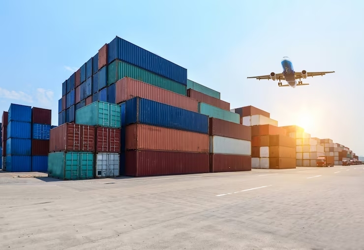 Witness the graceful flight of an airplane above a vibrant container terminal, where reasons for using shipping containers for storage for global trade.