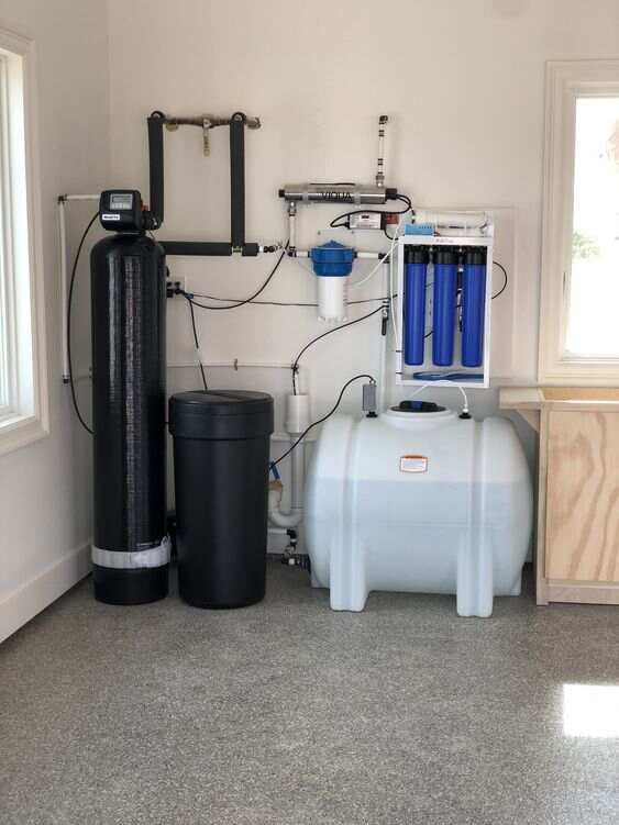 Water collection and filtration in shipping container accessories