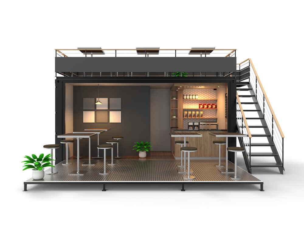 A spacious bar with a long counter and numerous chairs, set against a backdrop of shipping containers running in cafes.